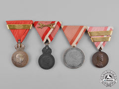 Austria, Empire. A Grouping Of Four Bravery And Merit Medals