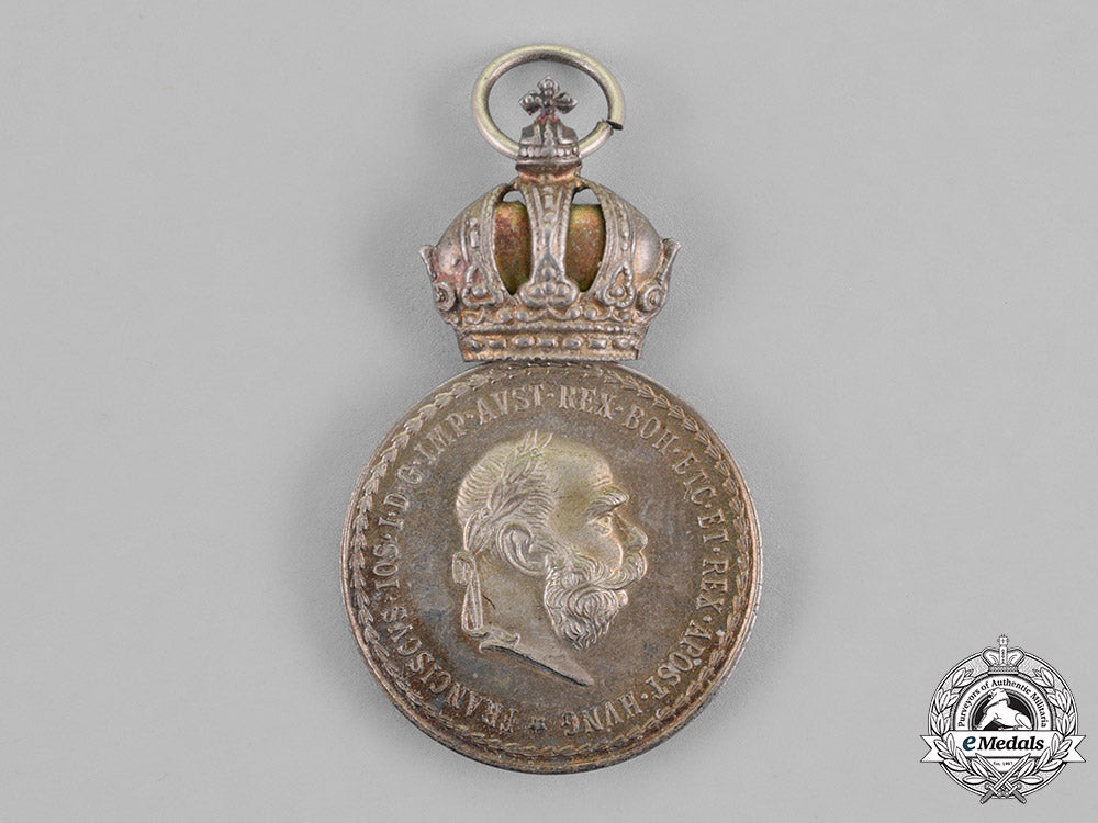 austria,_empire._a_grouping_of_four_bravery_and_merit_medals_m18_8333