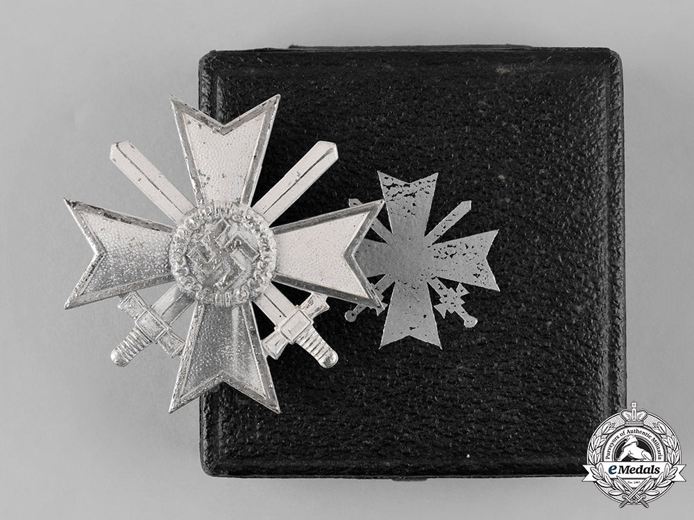 germany,_wehrmacht._a_cased_war_merit_cross,_i_class_with_swords,_by_b.h._mayer_m19_10124_2