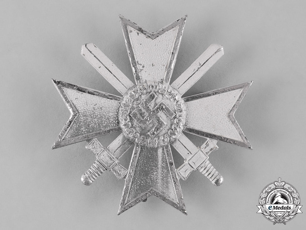 germany,_wehrmacht._a_cased_war_merit_cross,_i_class_with_swords,_by_b.h._mayer_m19_10125_2