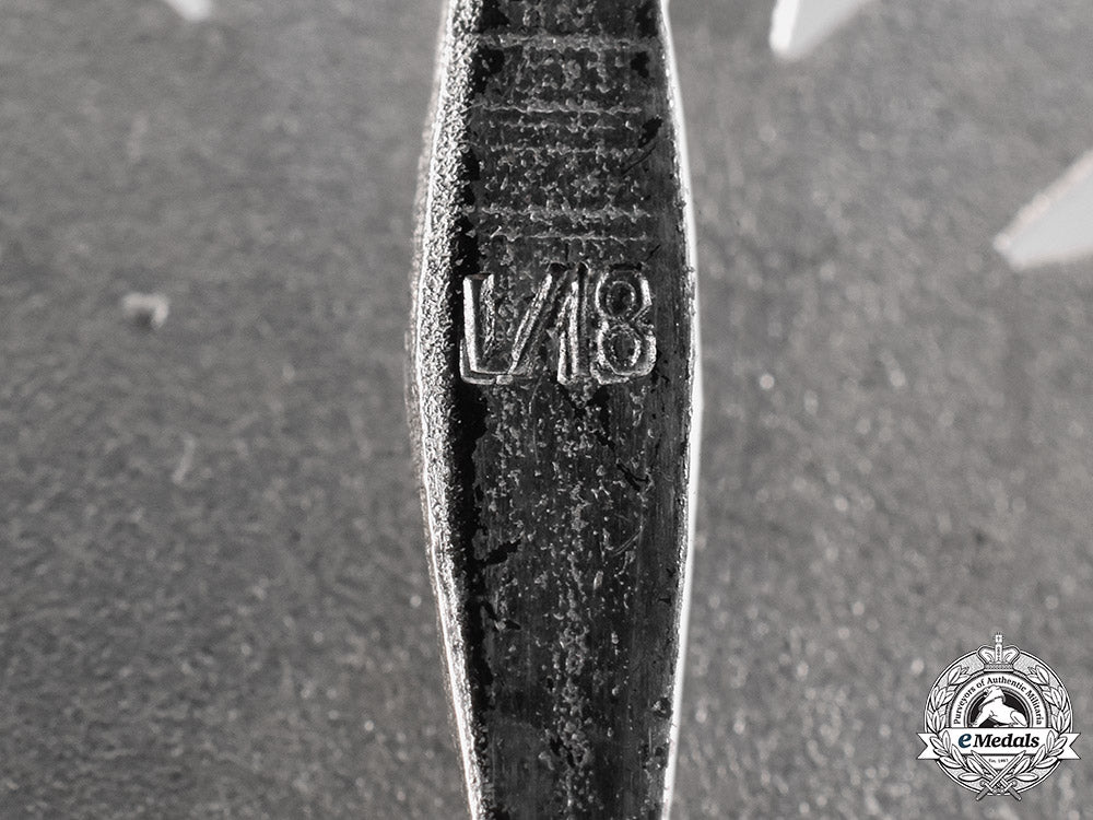 germany,_wehrmacht._a_cased_war_merit_cross,_i_class_with_swords,_by_b.h._mayer_m19_10131_2