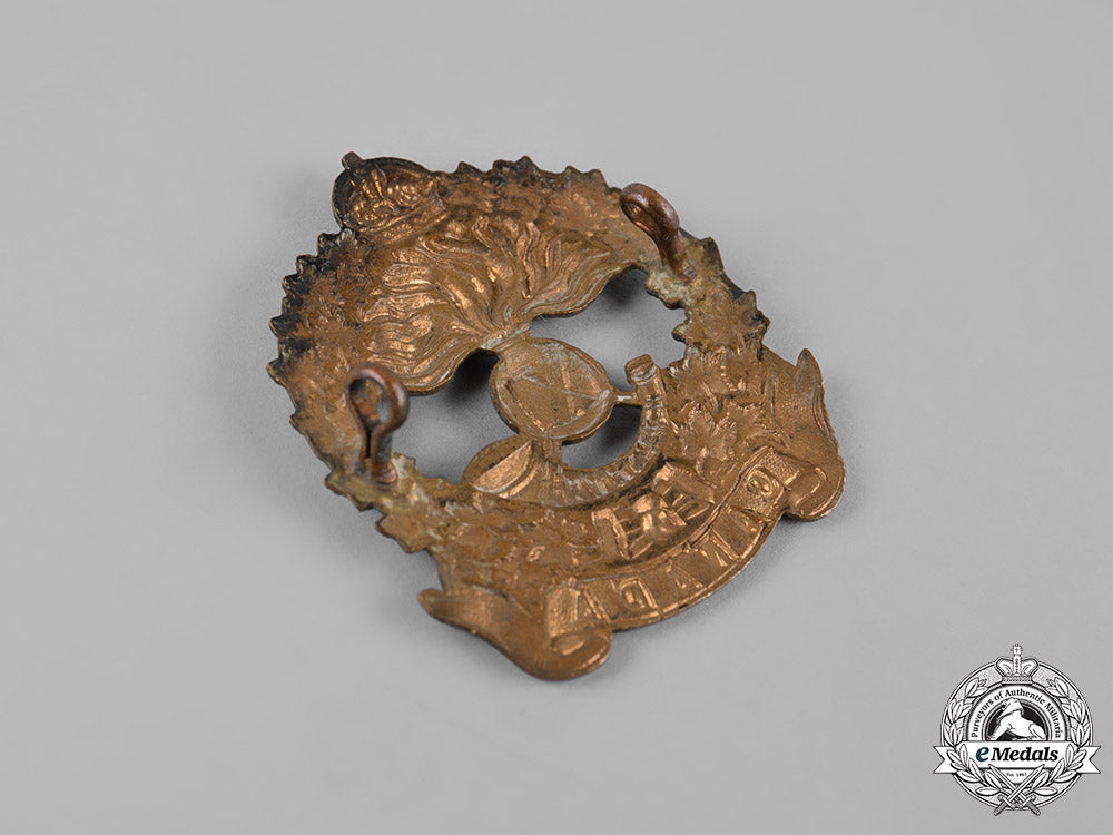 canada,_cef._an11_th_infantry_battalion_cap_badge,_c.1914_m19_11371