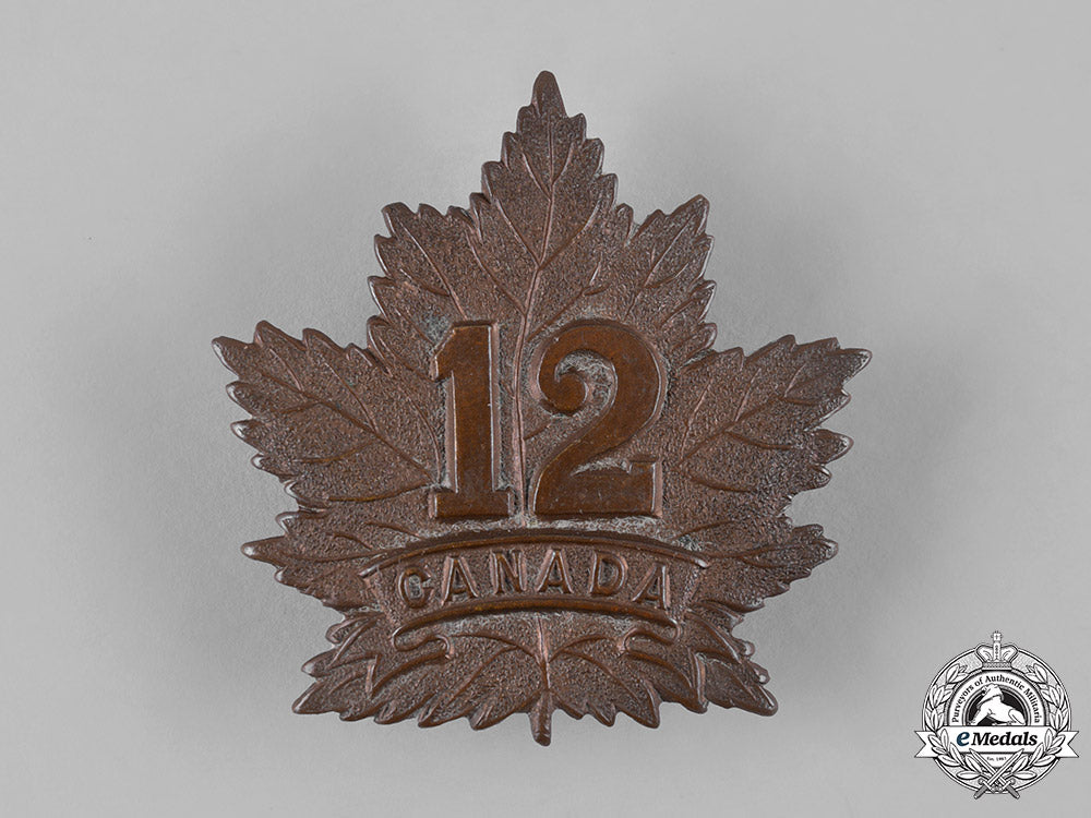 canada,_cef._a12_th_infantry_battalion_cap_badge,_c.1914_m19_11372