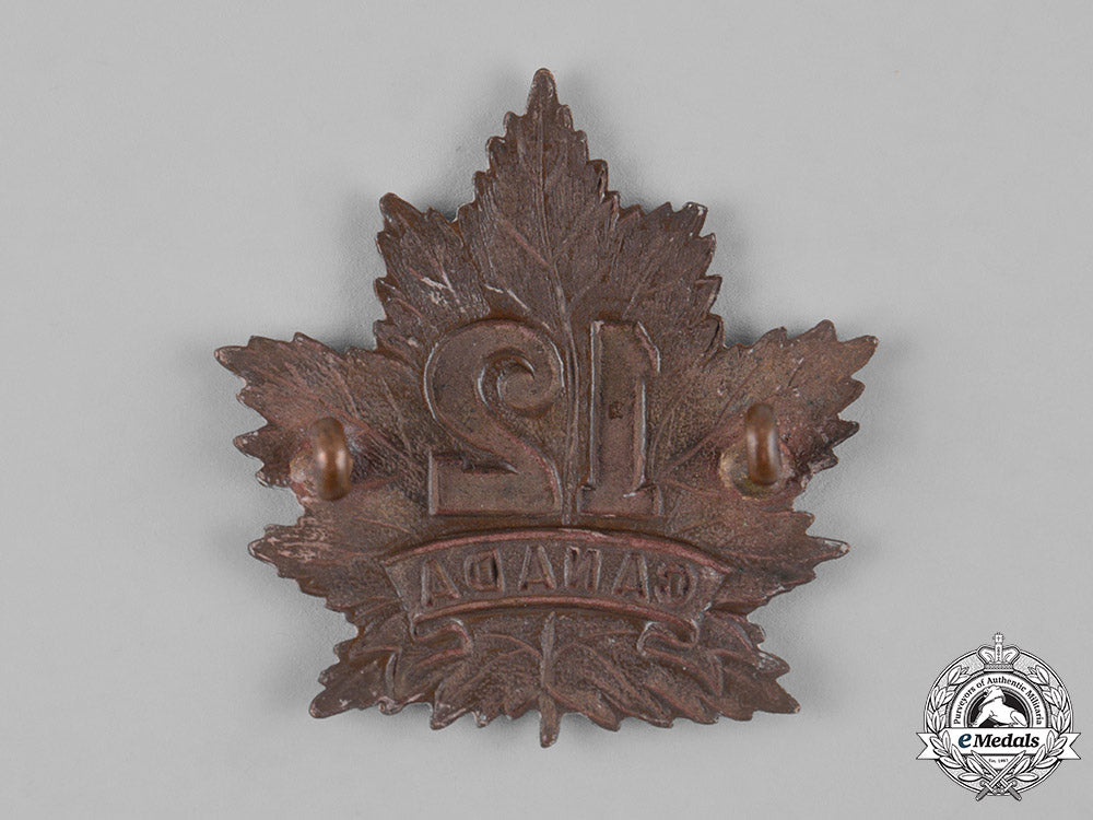 canada,_cef._a12_th_infantry_battalion_cap_badge,_c.1914_m19_11373