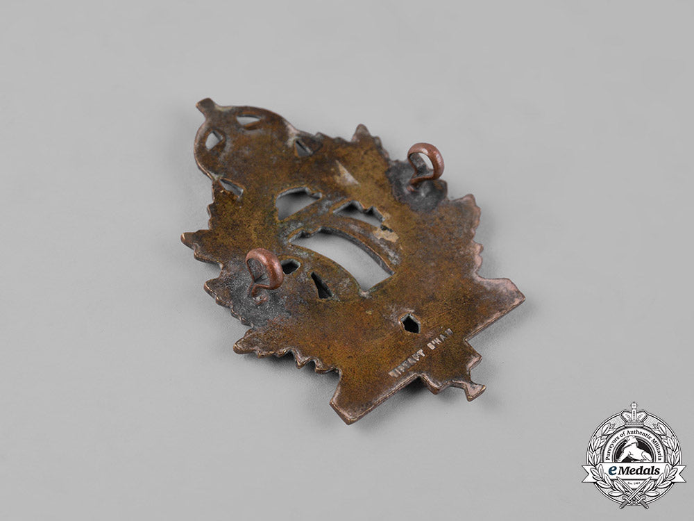 canada,_cef._a77_th_infantry_battalion"_ottawa_battalion"_cap_badge,_tiptaft,_c.1915_m19_11806