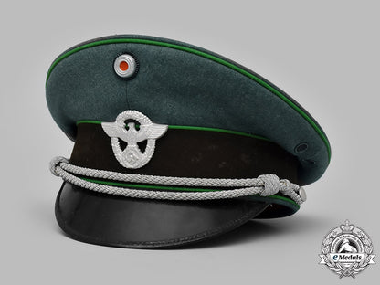 germany,_ordnungspolizei._a_schutzpolizei_officer’s_visor_cap_by_peter_küpper,_c.1939_m19_12981