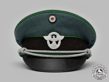 germany,_ordnungspolizei._a_schutzpolizei_officer’s_visor_cap_by_peter_küpper,_c.1939_m19_12982