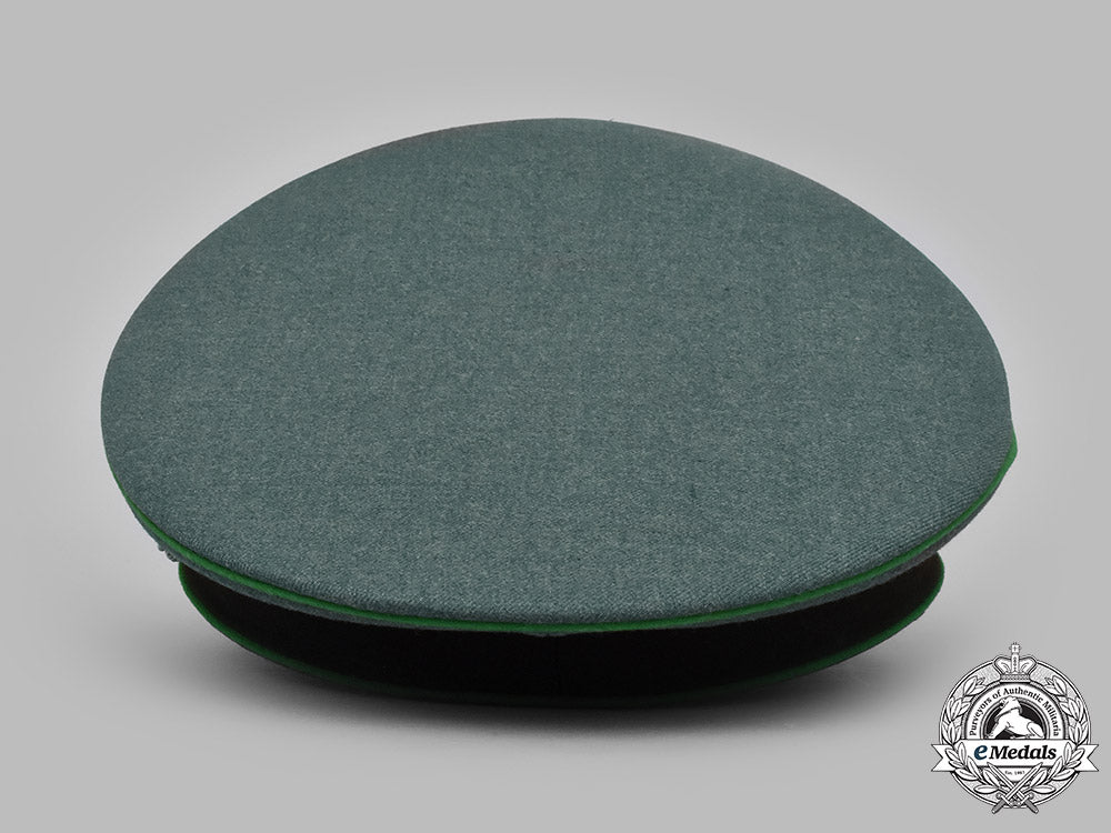 germany,_ordnungspolizei._a_schutzpolizei_officer’s_visor_cap_by_peter_küpper,_c.1939_m19_12984