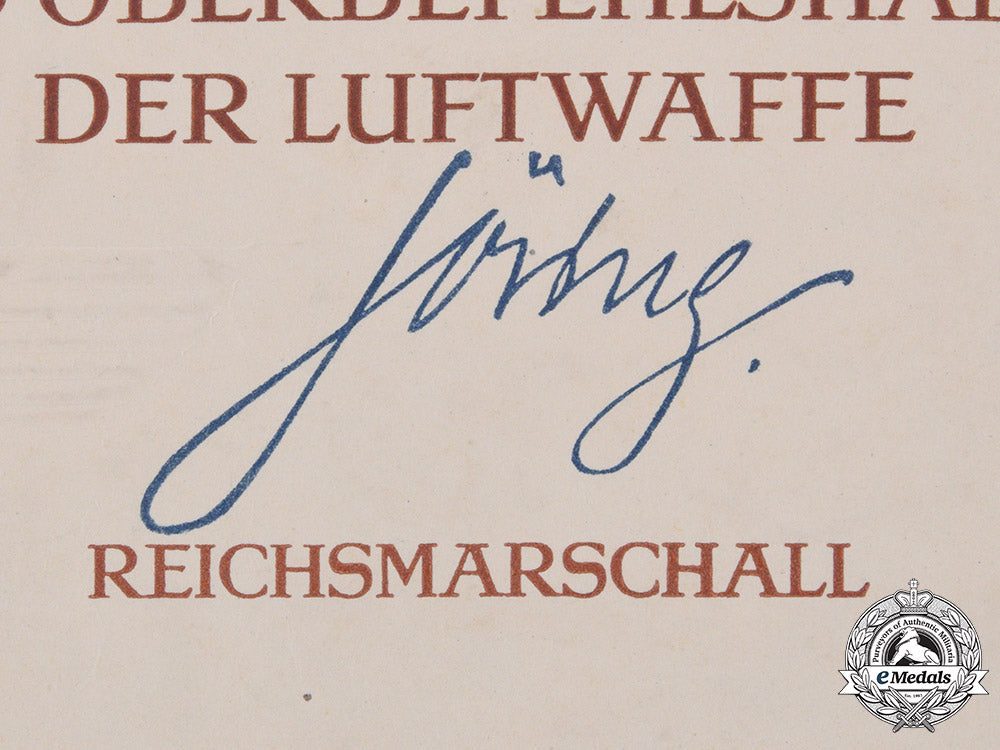 germany,_luftwaffe._an_award_certificate_for_a_german_cross_in_gold_to_oberfeldwebel_fritz_heyland,_signed_by_reichsmarschall_hermann_göring_m19_13692