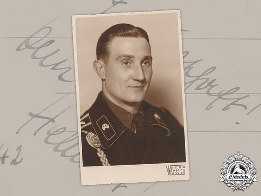 germany,_heer._a_studio_portrait_of_a_panzer_nco_with_dedication_from_russia,1942_m19_1409_1_1_1_1