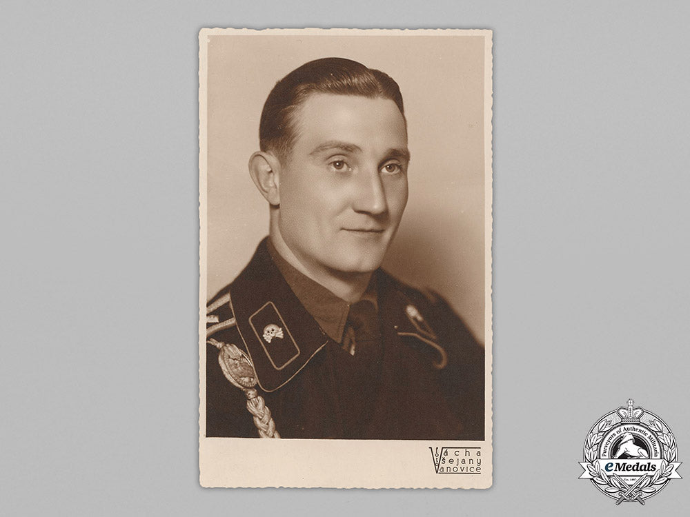 germany,_heer._a_studio_portrait_of_a_panzer_nco_with_dedication_from_russia,1942_m19_1410_1_1_1_1