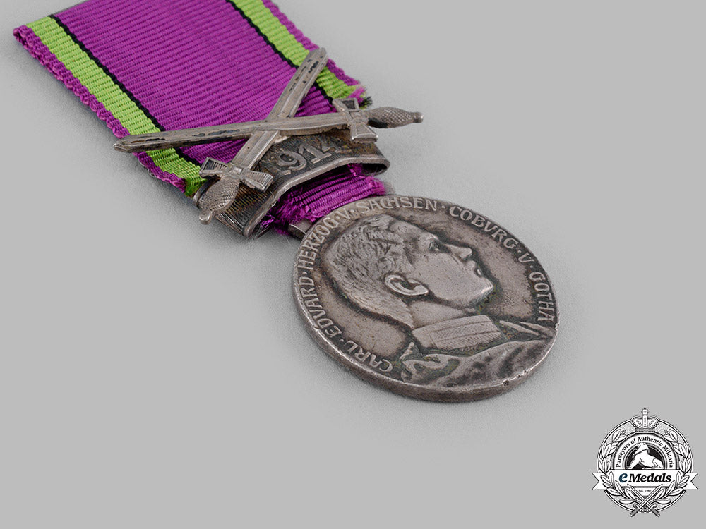 saxe-_coburg_and_gotha,_duchy._a_saxe-_ernestine_house_order,_silver_merit_medal_with_sword_clasp1914_m19_15070
