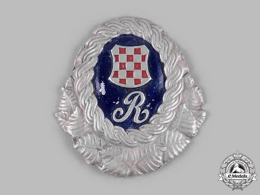 croatia,_independent_state._a_ustasha_officer’s_cap_badge_m19_16700