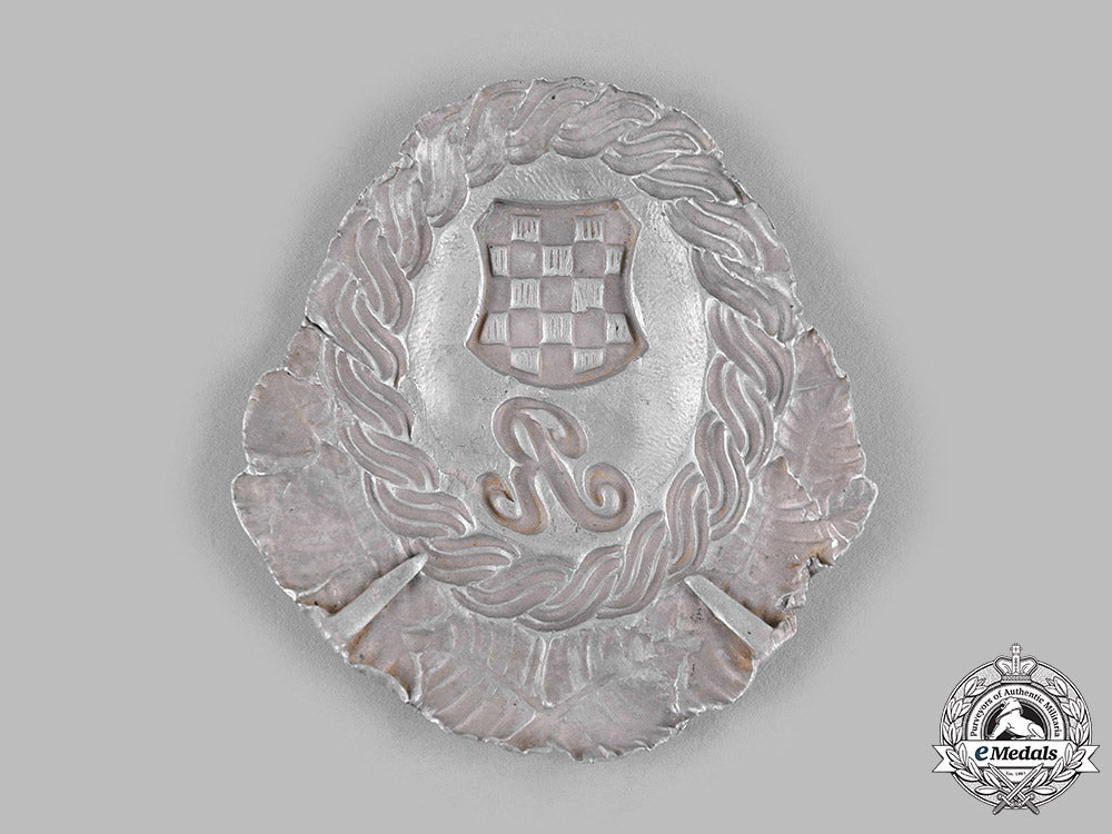 croatia,_independent_state._a_ustasha_officer’s_cap_badge_m19_16701