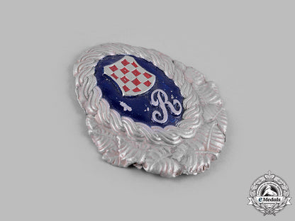 croatia,_independent_state._a_ustasha_officer’s_cap_badge_m19_16702