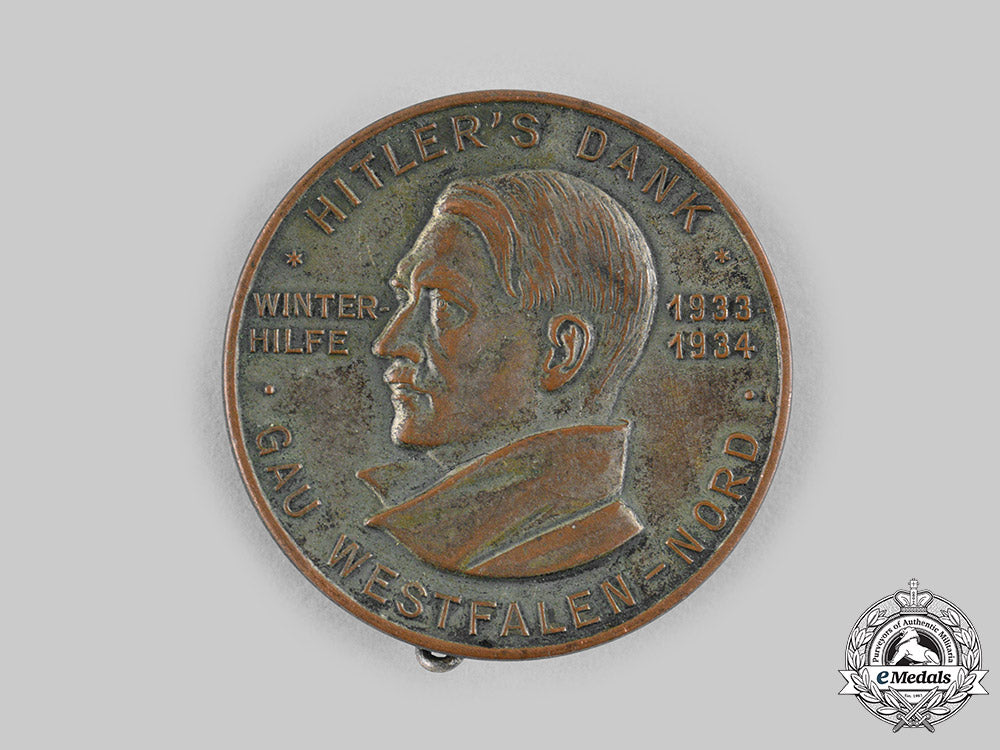 germany,_third_reich._a1933/1934_winterhilfswerk_donor_gratitude_badge_by_paulmann&_crone_m19_17182