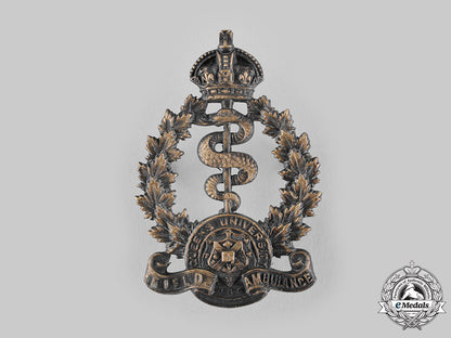 canada,_cef._a2_nd_canadian"_queen's_university"_field_ambulance_cap_badge,_c.1915_m19_17673