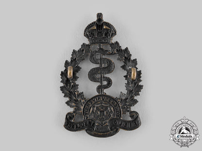 canada,_cef._a2_nd_canadian"_queen's_university"_field_ambulance_cap_badge,_c.1915_m19_17674