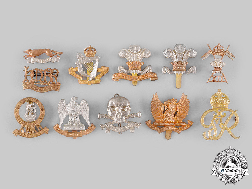 united_kingdom._a_lot_of_eleven_regimental_badges_m19_19206