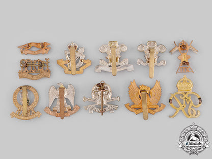 united_kingdom._a_lot_of_eleven_regimental_badges_m19_19207