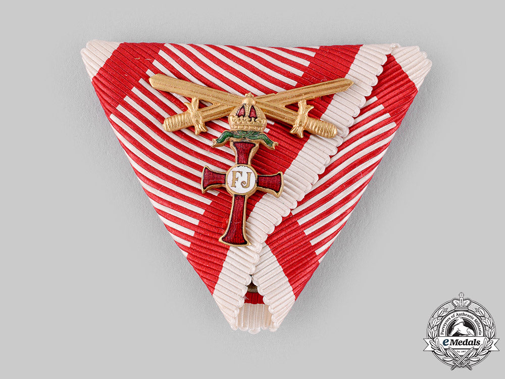 austria,_empire._an_order_of_franz_joseph_war_decoration_and_gold_swords_m19_19454