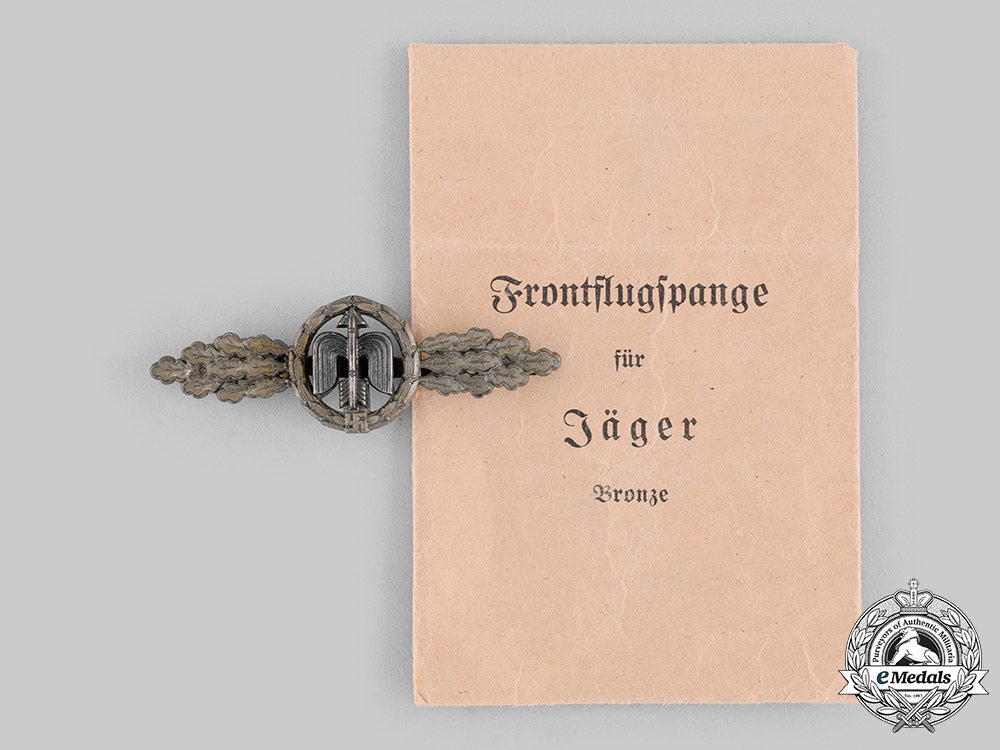 germany,_luftwaffe._a_short_range_day_fighter_clasp,_bronze_grade,_by_g.h._osang,_with_envelope_m19_19813_1_1_1