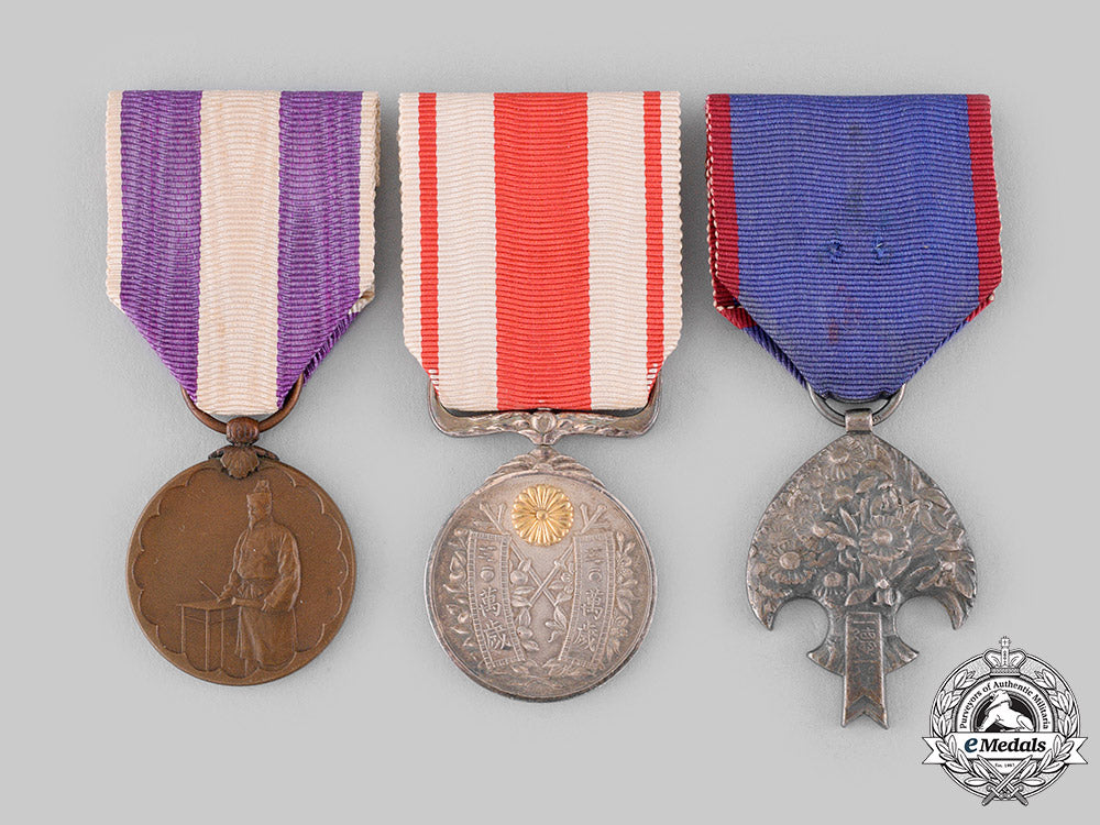 japan,_empire-_occupied_manchukuo._three_medals&_awards_m19_19859