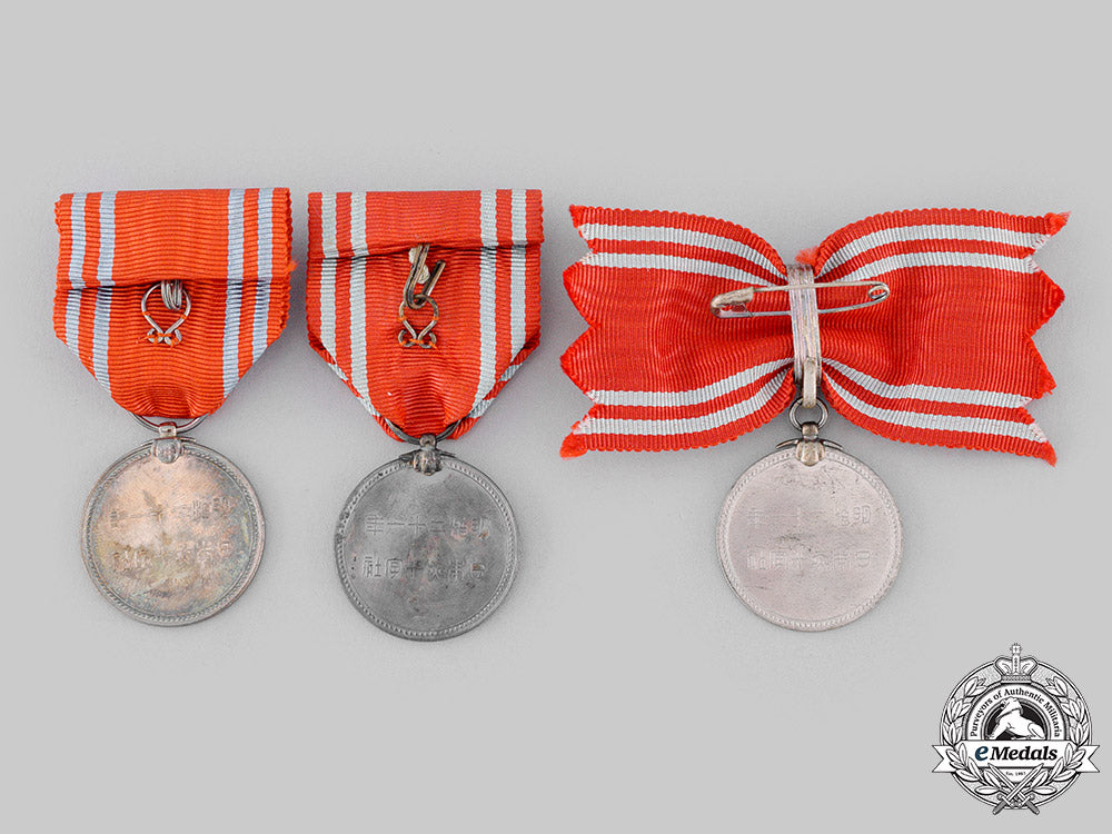 japan,_empire._three_japanese_red_cross_society_medals_m19_19896