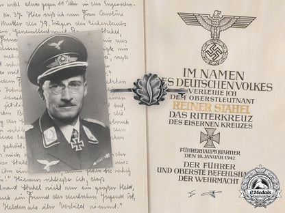 germany,_luftwaffe._the_oak_leaves,_knight’s_cross_document_with_presentation_folder_to_generalleutnant_rainer_stahel_m19_20176