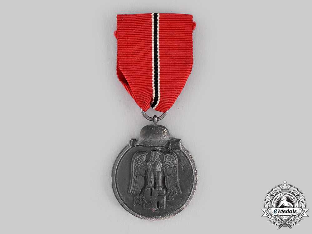 germany,_wehrmacht._an_eastern_front_medal,_with_package_of_issue,_by_carl_poellath_m19_20620