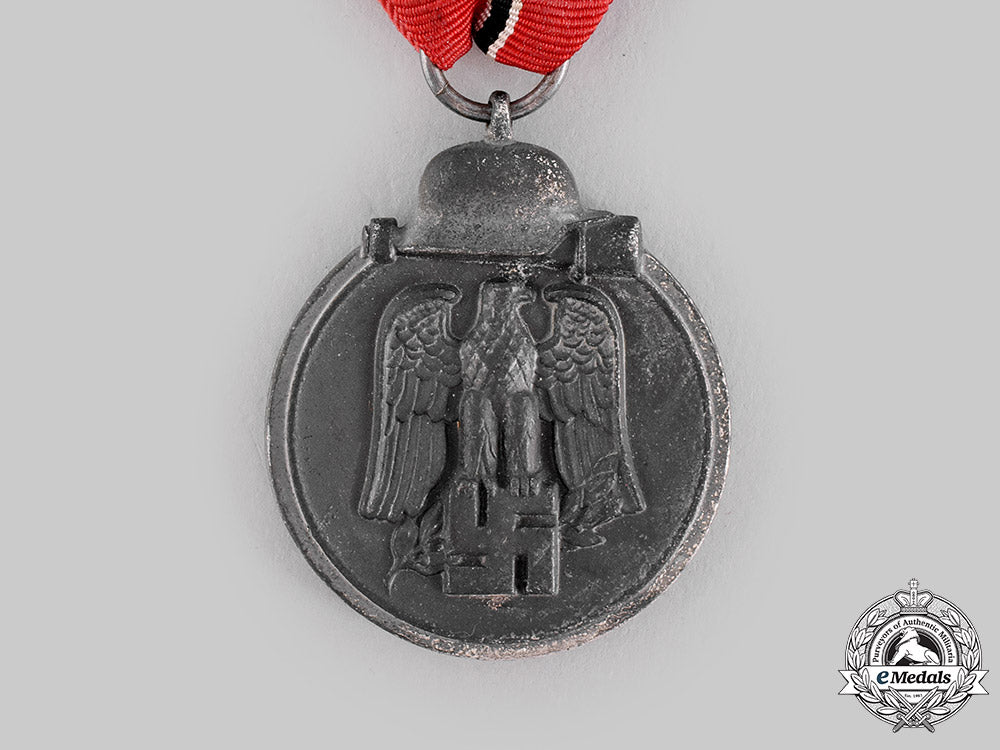 germany,_wehrmacht._an_eastern_front_medal,_with_package_of_issue,_by_carl_poellath_m19_20621
