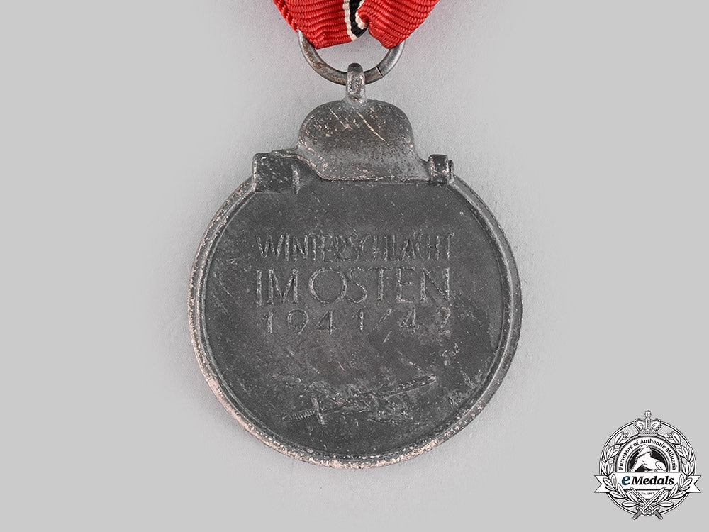 germany,_wehrmacht._an_eastern_front_medal,_with_package_of_issue,_by_carl_poellath_m19_20622