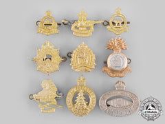 Canada. A Lot Of Nine Cap Badges And Collar Tabs