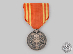 Japan, Occupied Manchukuo. A Red Cross Membership Medal