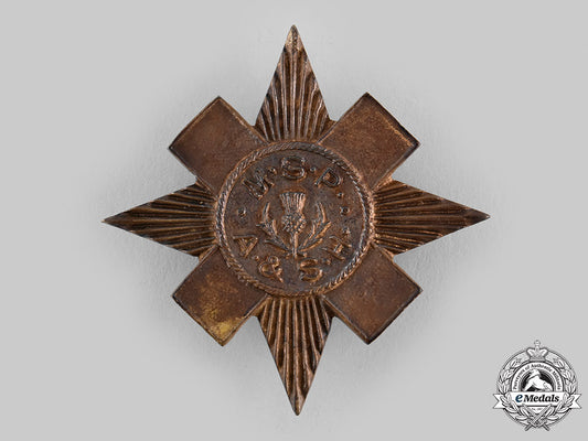 canada,_commonwealth._an_argyle_and_sutherland_highlanders_military_school_of_pipers_cap_badge,_c.1940_m19_22523