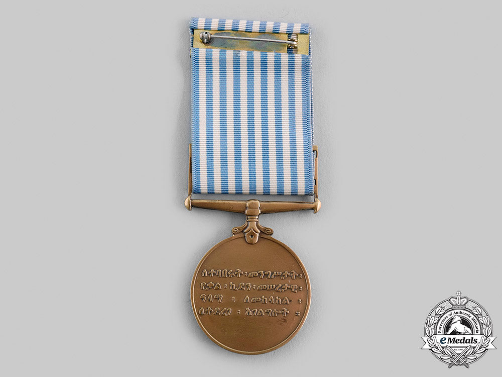ethiopia,_empire;_united_nations._a_united_nations_service_medal_for_korea_with_amharic_text_m19_23441