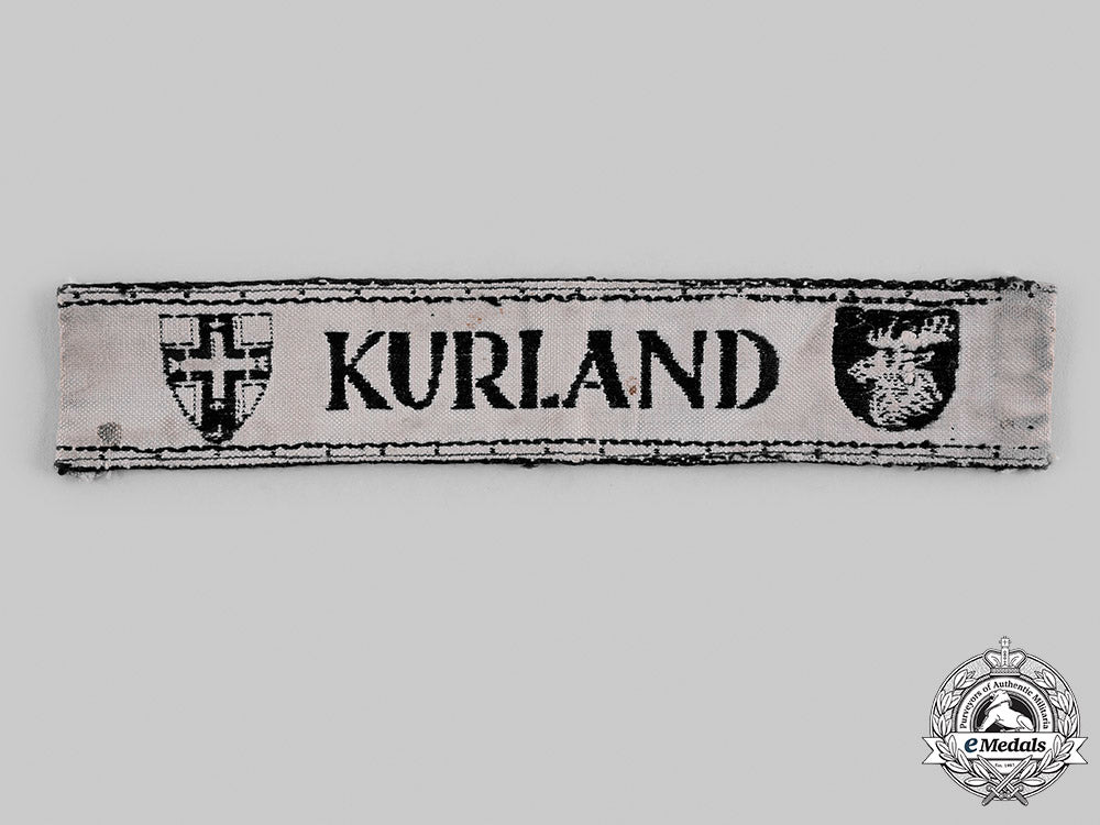 germany,_heer._a_kurland_cuff_title,_with_award_document,_to_karl-_heinz_holtkötter_m19_24187