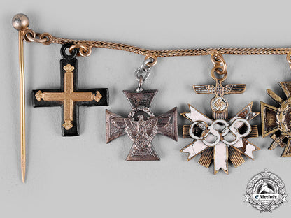 germany,_third_reich._an_olympic_decoration_miniature_medal_chain,_by_wilhelm_deumer_m19_24405