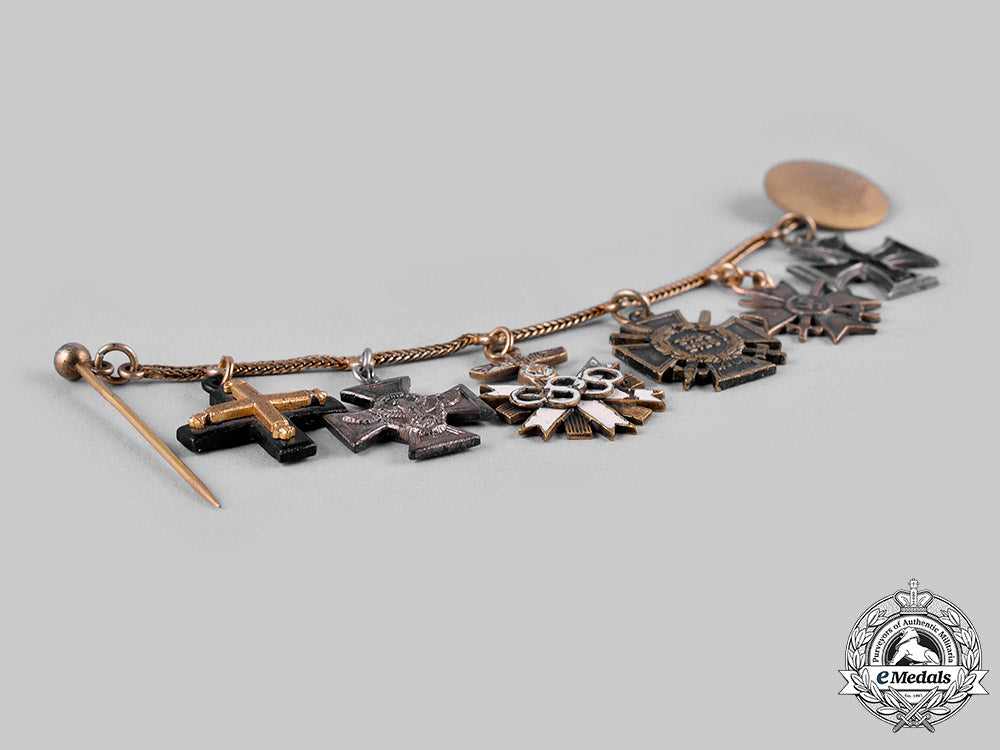 germany,_third_reich._an_olympic_decoration_miniature_medal_chain,_by_wilhelm_deumer_m19_24407