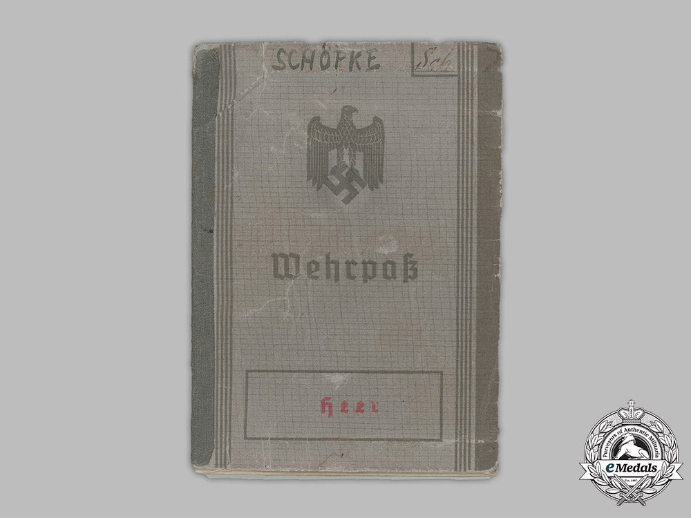 germany,_heer._a_wehrpaß_belonging_to_otto_schöpke,_bandenkampfabzeichen_recipient_m19_3097_1