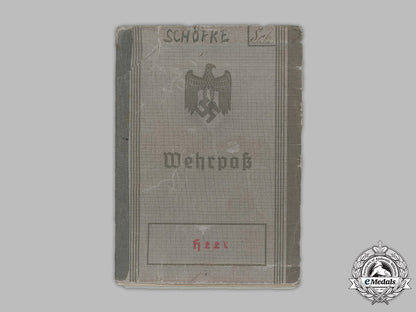 germany,_heer._a_wehrpaß_belonging_to_otto_schöpke,_bandenkampfabzeichen_recipient_m19_3097_1