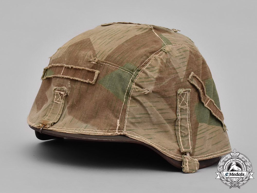 germany,_heer._a_heer_m40_steel_helmet_with_camouflage_cover_m19_3605