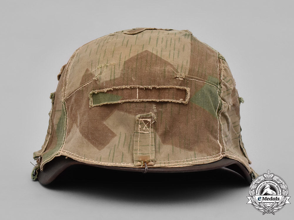 germany,_heer._a_heer_m40_steel_helmet_with_camouflage_cover_m19_3606
