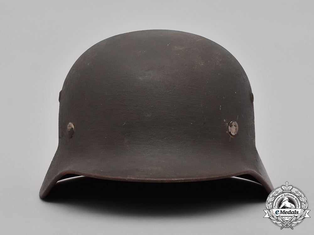 germany,_heer._a_heer_m40_steel_helmet_with_camouflage_cover_m19_3607