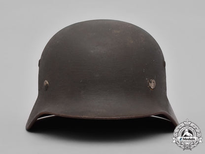 germany,_heer._a_heer_m40_steel_helmet_with_camouflage_cover_m19_3607