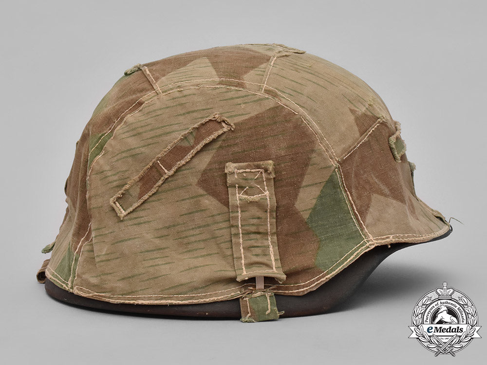 germany,_heer._a_heer_m40_steel_helmet_with_camouflage_cover_m19_3608