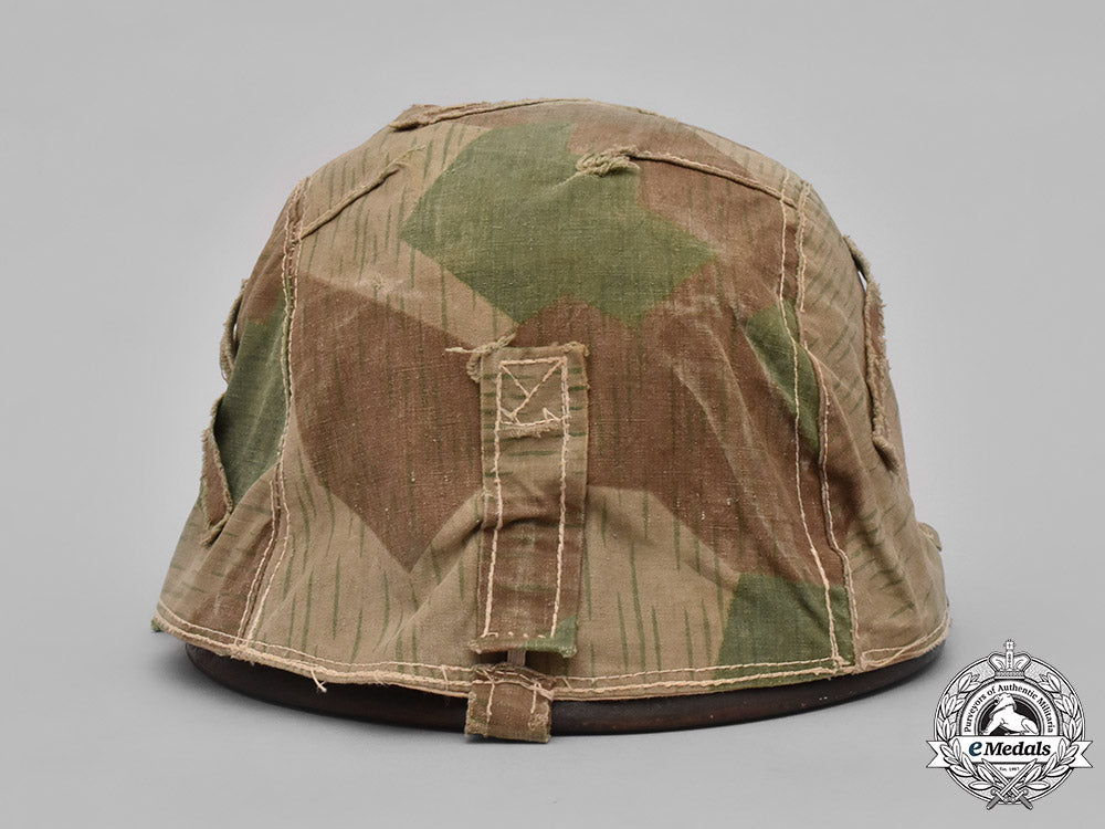 germany,_heer._a_heer_m40_steel_helmet_with_camouflage_cover_m19_3610