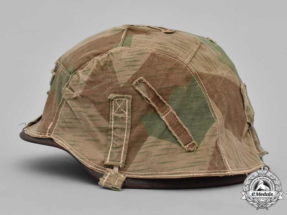 germany,_heer._a_heer_m40_steel_helmet_with_camouflage_cover_m19_3612