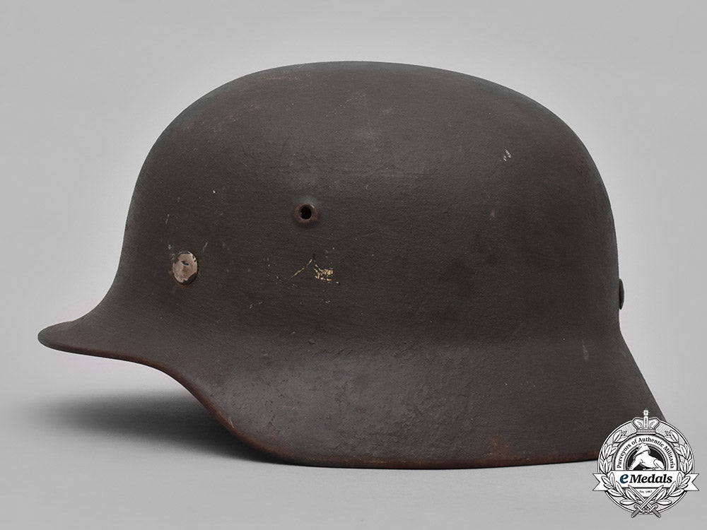 germany,_heer._a_heer_m40_steel_helmet_with_camouflage_cover_m19_3613