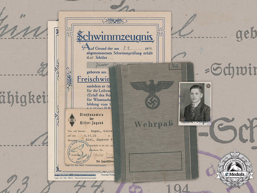 germany,_hj._a_wehrpaß_and_documents_to16_year_old_günter_nagel,_april1945_m19_5972